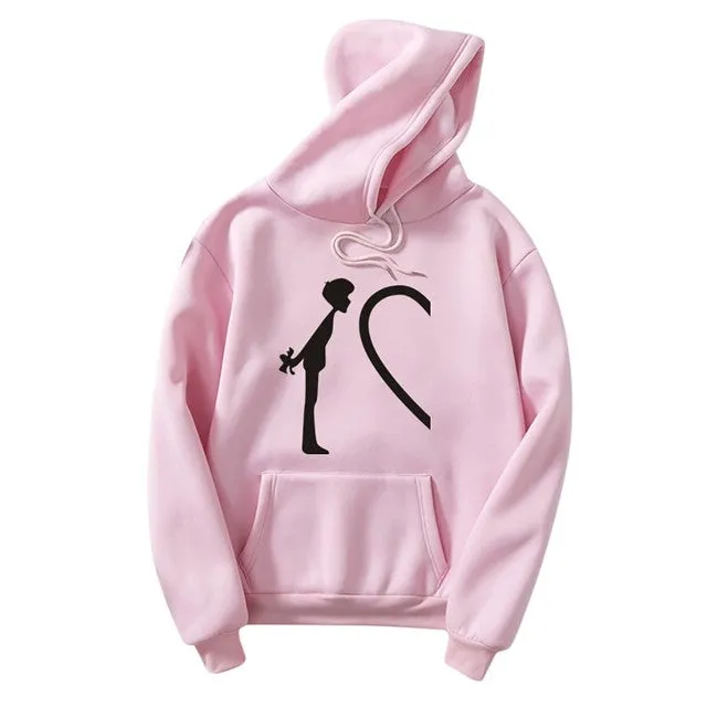 Couple hoodies kiss