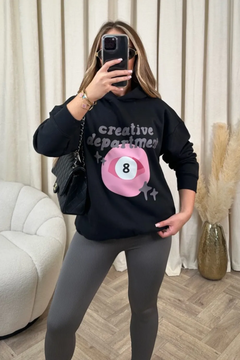 Creative department black printed relaxed hoodie