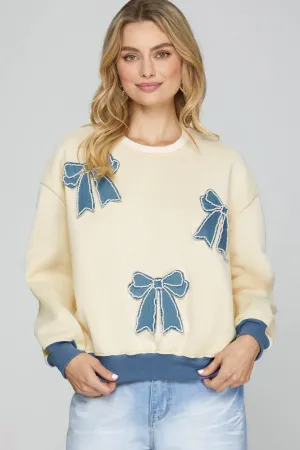 DENIM PEARL BOW PATCH LONG SLEEVE SWEATSHIRT